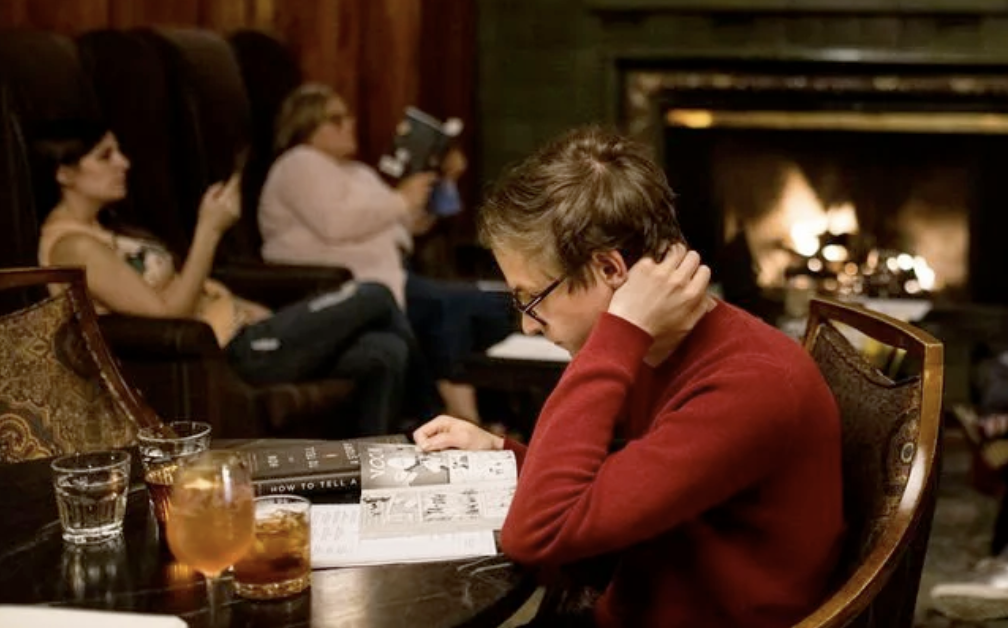 three people reading quietly